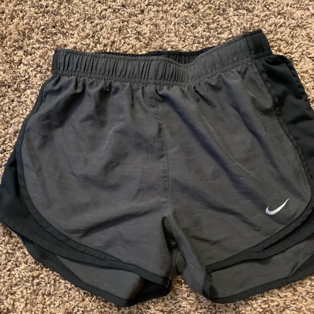 Black and gray Nike running shorts